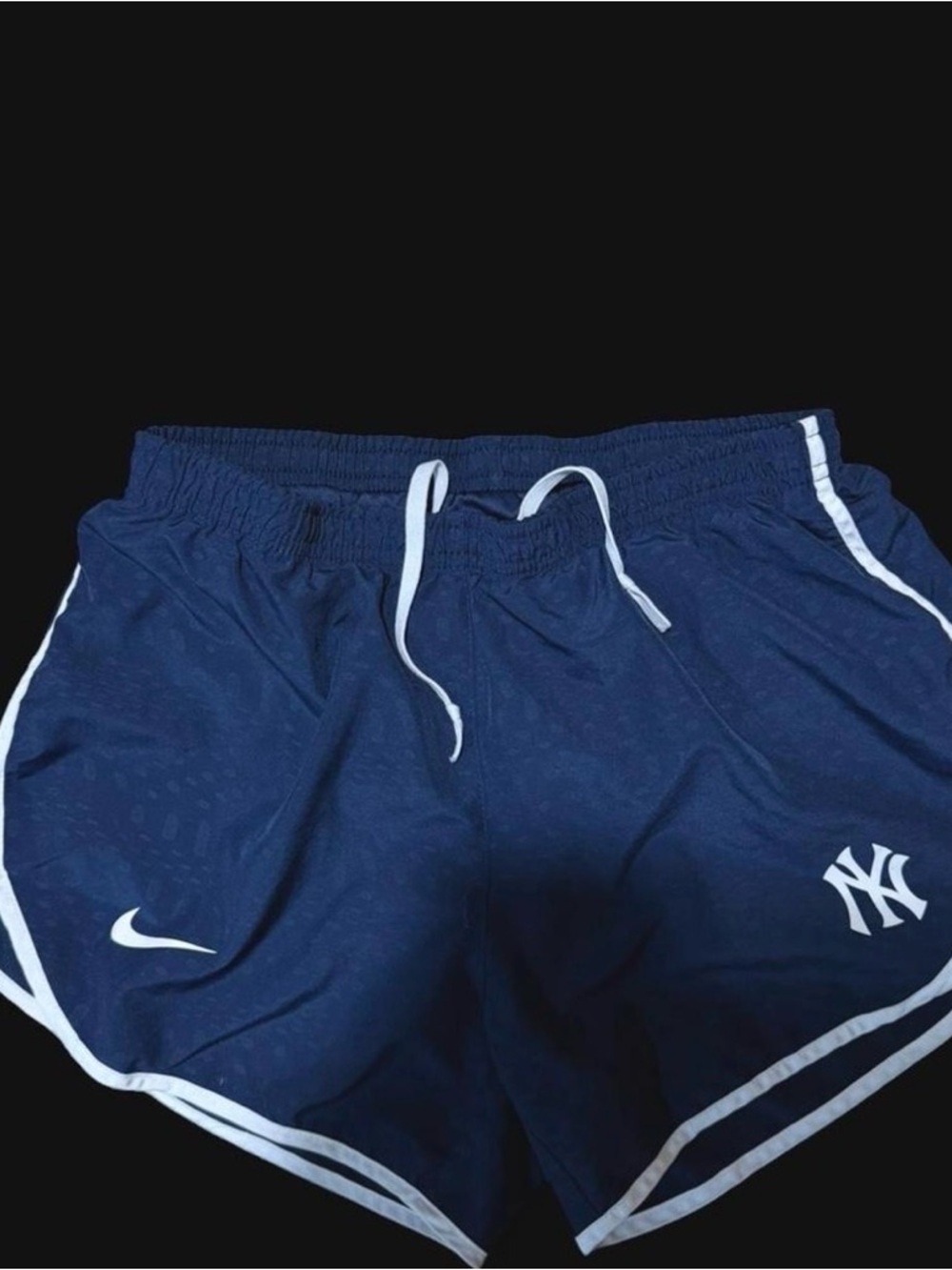 Navy and white Nike New York Yankees shorts